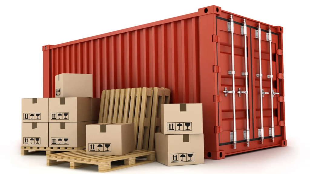 A red shipping container with boxes and handling symbols nearby.






